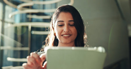 Smile, tablet and business woman in office to check email for compliance update, research or review....