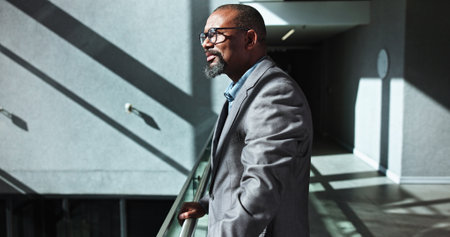 Glasses, thinking and business black man in office for conference, keynote speaker and reflection. Capital venture, investor expo and future with person of seminar for vision and account advisorの写真素材