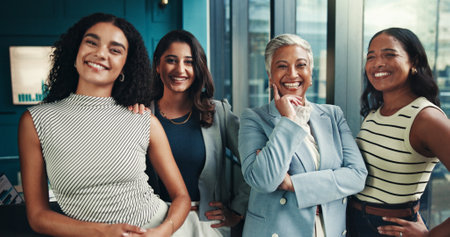 Group, finance or portrait of women in business with graphs, forecasting or accounting charts. Financial team, confident or female economic analyst with confidence for about us, meeting or investmentの写真素材