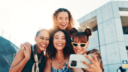 Selfie, group and women in city, fashion and profile picture with happiness, support and urban town. Outdoor, people and friends in street, streetwear or swag with diversity together or youth cultureの写真素材