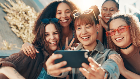 Selfie, people and women in city, fashion and profile picture with happiness, trendy and urban town. Outdoor, group and friends in street, youth culture or swag with diversity together or supportの写真素材