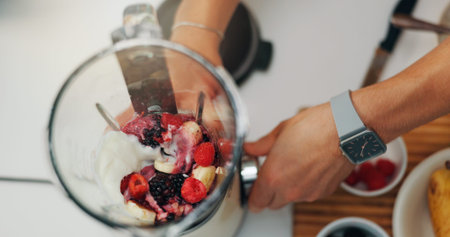 Fruit smoothie, hands and person with blender for breakfast shake, meal replacement and organic...
