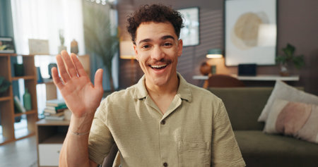Home, greeting and man with video call, portrait and smile with hello, conversation and virtual...