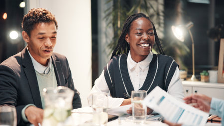 Documents, office and business people in meeting for financial review, budget report and feedback. Corporate team, professional and workers with paperwork for collaboration, strategy and planningの写真素材