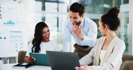 Laptop, meeting and business people in office with good news, achievement or team promotion....