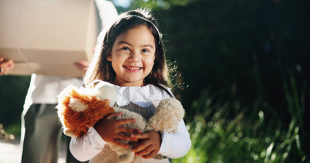 Kid, moving and happy with teddy bear by new home for property relocation, mortgage investment or...