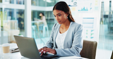Finance, businesswoman and typing on laptop in office for tax compliance report, risk management and...