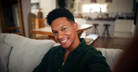 Man, happy and selfie in home for social media, influencer or content creation with smile in...