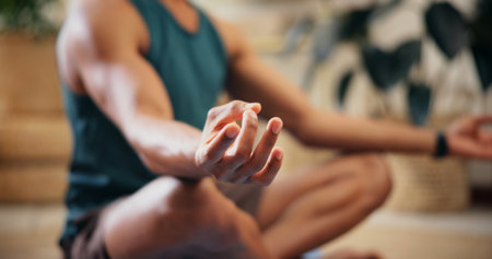 Hands, man and lotus for yoga at house for meditation, zen balance and breathing for mindfulness. Male person, pilates and fitness exercise for morning peace, spiritual healing and holistic wellnessの写真素材