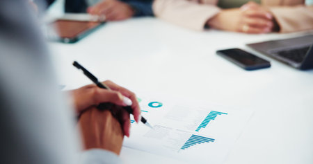 Documents, finance and hands of business people in office for statistics, profit or revenue analysis. Meeting. paperwork and financial managers with data report for budget planning with discussion.の写真素材