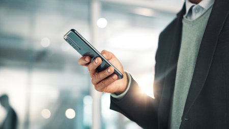 Business man, hands and scroll with phone in office for stock market price, trading account and check email. Professional, trader and smartphone for online investment, reading economy news and updateの写真素材