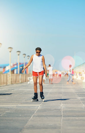 Woman. rollerskate and active for summer with hobby for fitness or health outdoors for exercise....