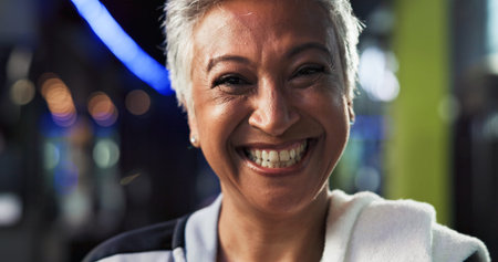 Portrait, smile and mature woman in gym, fitness or confident for exercise routine or determination....
