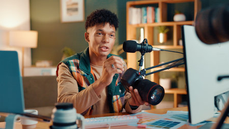 Influencer, camera and man with mic for podcast, review or social media broadcast. Filming, product...
