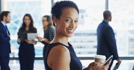 Portrait, businesswoman and lawyer in office with phone, corporate career or legal aid to contact. Coffee, female person and attorney with mobile for law firm, case email or justice update with smileの写真素材