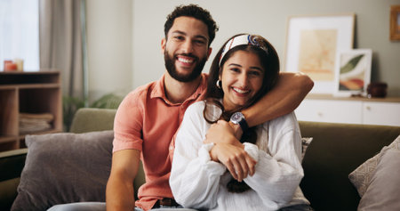 Hug, happy couple and portrait in living room with smile, bonding and weekend date in apartment....