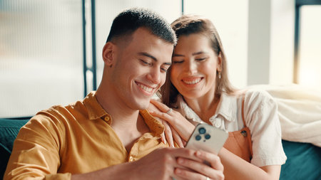 Phone, relax and weekend with couple on sofa in living room of home for break or internet browsing....