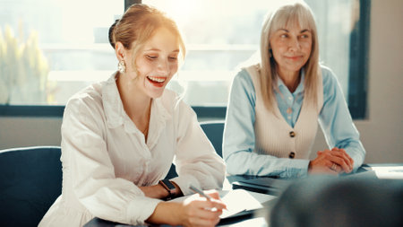 Financial advisor, business or women with paperwork for meeting for finance, report and review. Investment portfolio, documents or auditor in office for accounting audit, teamwork and performanceの写真素材