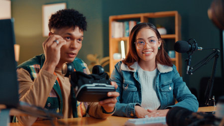 People, team and podcast with vr goggles for gaming review, online streaming or tips at office. Happy, employees or influencers with smile or technology for live recording, tutorial or gamer guideの写真素材