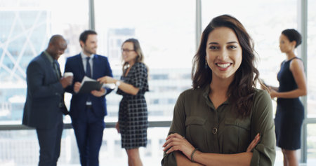 Office, business and portrait of happy woman with crossed arms for confidence, pride and financial planner. Professional staff, corporate and person for about us in finance career, job or opportunityの写真素材