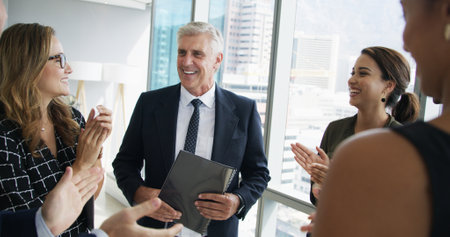 Applause, briefing and business people with manager in office for corporate budget feedback. Meeting, clapping hands and team of financial advisors with mentor for investment planning in workplace.の写真素材