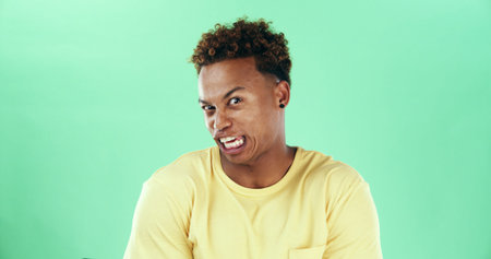 Portrait, disgusted and man with reaction, studio and facial expression for disapproval and dislike....