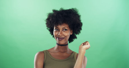 Black woman, confident and fashion for choker necklace, retro aesthetic or afro on green background....