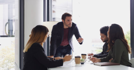Legal, talk or manager in meeting with team, group project and negotiation in law boardroom. Leader, business people and attorney in office for private practice, collaboration and corporate justiceの写真素材
