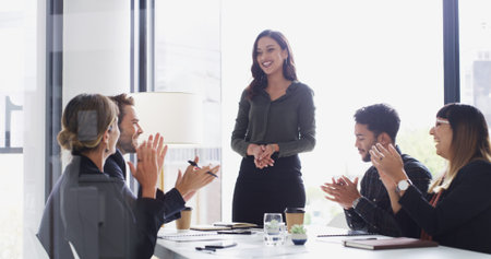 Colleagues, applause and praise for woman, boardroom and speaker with smile for proposal or success....