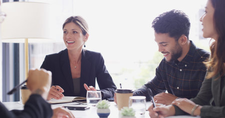 Collaboration, group and colleagues in boardroom, smile and discussion for investment and corporate....