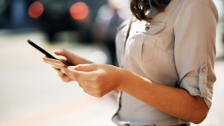 Woman, hands or phone with credit card for online banking, payment or shopping app in city. Bokeh,...