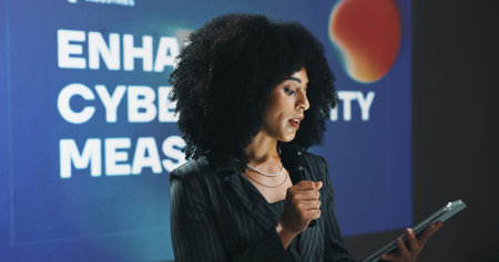 Business woman, presentation or seminar with tablet or mic for speech or cybersecurity convention....