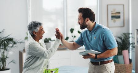 Mature woman, physiotherapist and high five at clinic for recovery, goals and happy for good news....