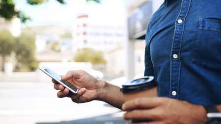 Creative man, hand and phone in city for travel, networking and taxi app for ride booking....