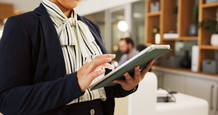 Hands, tablet and manager with woman in hotel for online booking, concierge and guest check in....