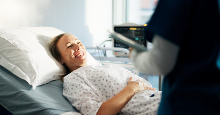 Happy, woman and bed with nurse on tablet for good news, medical report and surgery feedback....