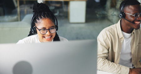 Happy, business people and computer with headset for customer service at call center office. Woman, man or consultants with smile for virtual assistance, agency help or online advice at workplaceの写真素材