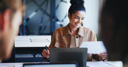 Business, smile and woman with documents, laptop and research for article, copywriting and editing. Person, employee and journalist in office, paperwork and news report with proofreading and techの写真素材