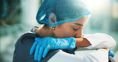 Sad, woman and doctor on floor at hospital of medical mistake, surgery fail and patient loss. Upset,...