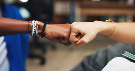 College, hands and students with fist bump in library for learning success, exam results or support....