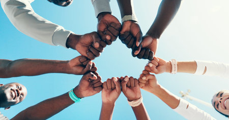 Outdoor, group and fist bump for sports, celebration or collaboration for fitness, hands and circle....