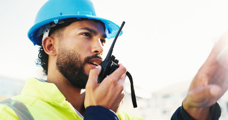 Inspection, radio and man with engineering, feedback and property renovation with quality control....