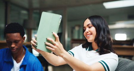 Selfie, college student and woman with smile, library and study aesthetic on social media and night. University, people and happy for profile picture on website, evening and photography for memoryの写真素材