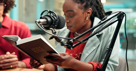 Bible, microphone and podcast with people in recording studio for religious study or streaming....