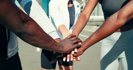 Hands together, community and teamwork with friends in city for support, fitness club or motivation. Sports challenge, exercise and connection with people outdoor for wellness, training or solidarityの写真素材