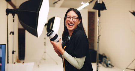 Camera, photographer and woman laughing in production studio for picture, photoshoot and portrait....