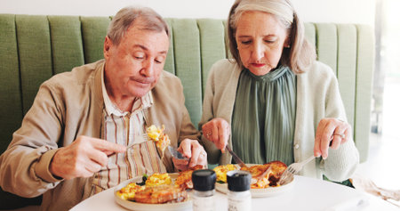Eating, breakfast or senior couple in cafe on date together in retirement for love, eggs or food....