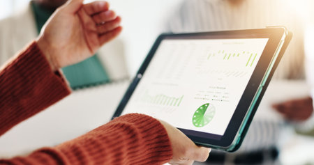 Meeting, screen and hands with tablet, colleagues and data analysis of revenue, presentation or app....