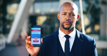 Phone screen, rejected or business man with portrait in city for loan application, RPA or poor...