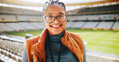 Event, portrait and smile of black woman in sports arena for VIP access or tour of stadium....